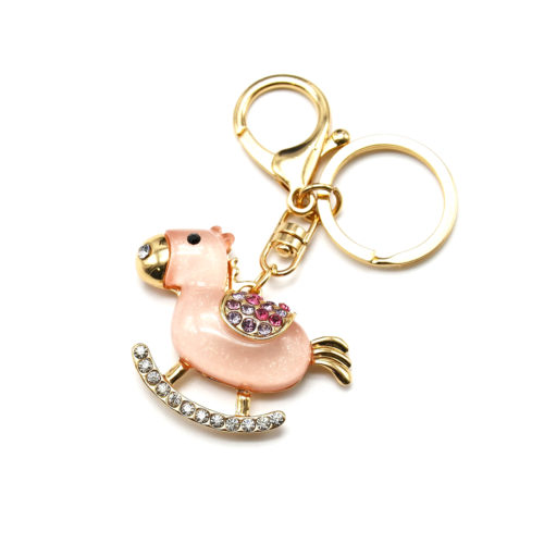 Porte-Cles-Bijou-de-Sac-Cheval-Bascule-Resine-Rose-avec-Strass