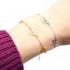Bracelet-Fine-Chaine-avec-Charms-Etoiles-Acier