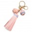 Porte-Cles-Bijou-de-Sac-Pompon-Franges-et-Charms-Simili-Cuir-Graine-Rose