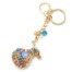 Porte-Cles-Bijou-de-Sac-Sac-Bourse-Metal-Dore-Orne-de-Pierres-Multicolore-et-Strass