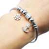 Bracelet-Jonc-Aimante-avec-Charms-Gouvernail-et-Ancre-Acier-Argente