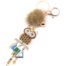 Porte-Cles-Bijou-de-Sac-Hibou-Metal-Peint-Beige-avec-Charms-et-Pompon