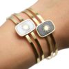 Bracelet-Jonc-Ajoure-avec-Pierre-Rectangle-Effet-Naturel-et-Soleil-Acier-Dore