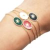 Bracelet-avec-Ovale-Email-Motif-Soleil-et-Contour-Acier-Dore