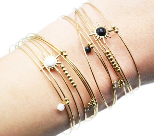 Bracelet-Semainier-Multi-Joncs-Acier-Dore-avec-Billes-Etoile-Polaire-et-Perles
