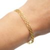 Bracelet-Jonc-avec-Motif-Ovales-Losanges-Ajoures-Acier-Dore