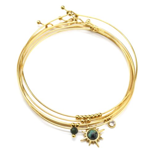 Bracelet-Semainier-Multi-Joncs-Acier-Dore-avec-Billes-Etoile-Polaire-et-Pierres-Vertes